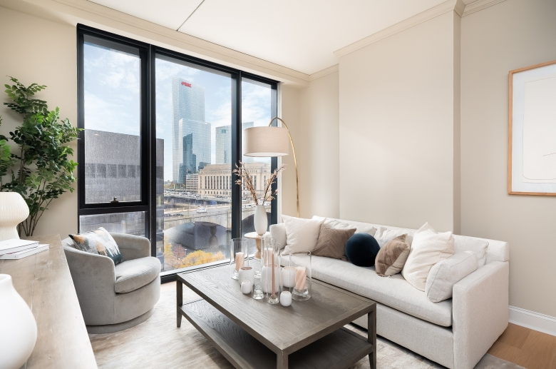 Furnished living room with city views