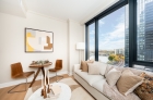 Furnished sample living room overlooking the Schuylkill River